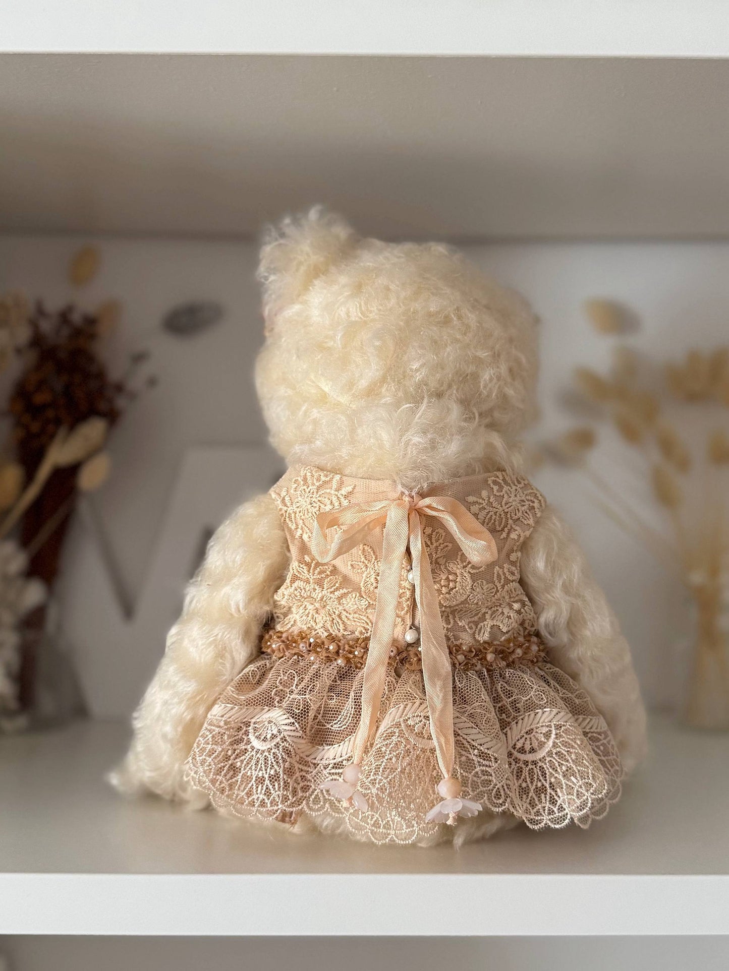 Hand-trimmed paws of OOAK mohair art bear Olivia by Povoroznyk.Teddy