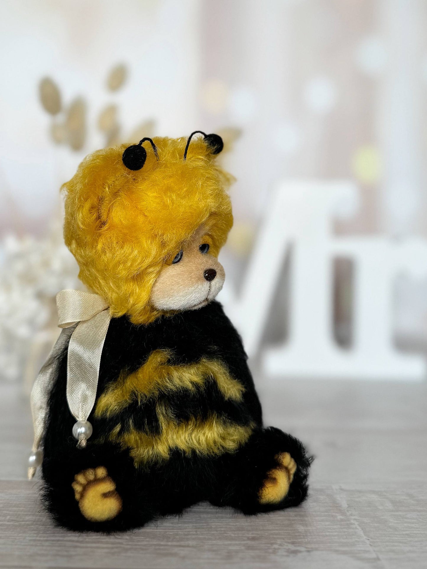 Little Sunny Bee teddy bear in handmade bee costume, outfit detail