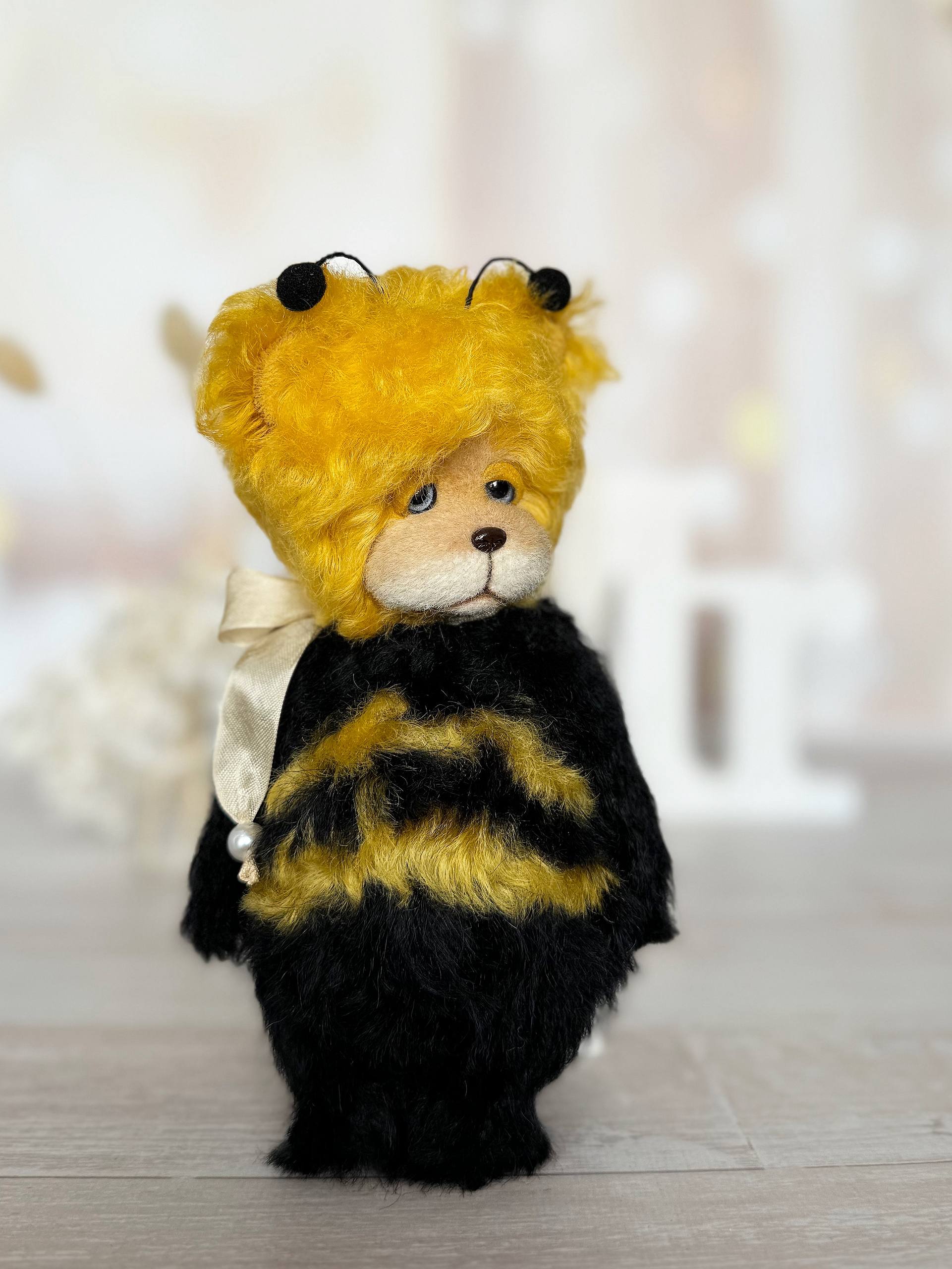 Handmade mohair teddy bear Little Sunny Bee in bee costume, front view