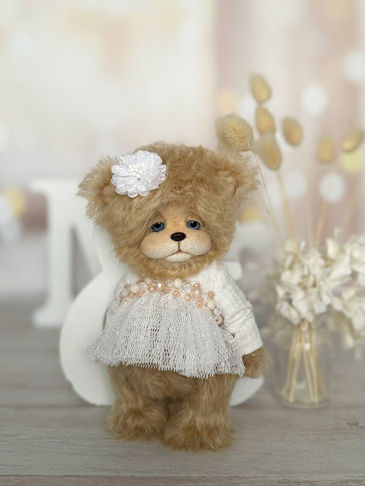 Lulu Pearl Bloom teddy bear close-up, handcrafted mohair bear with blue glass eyes