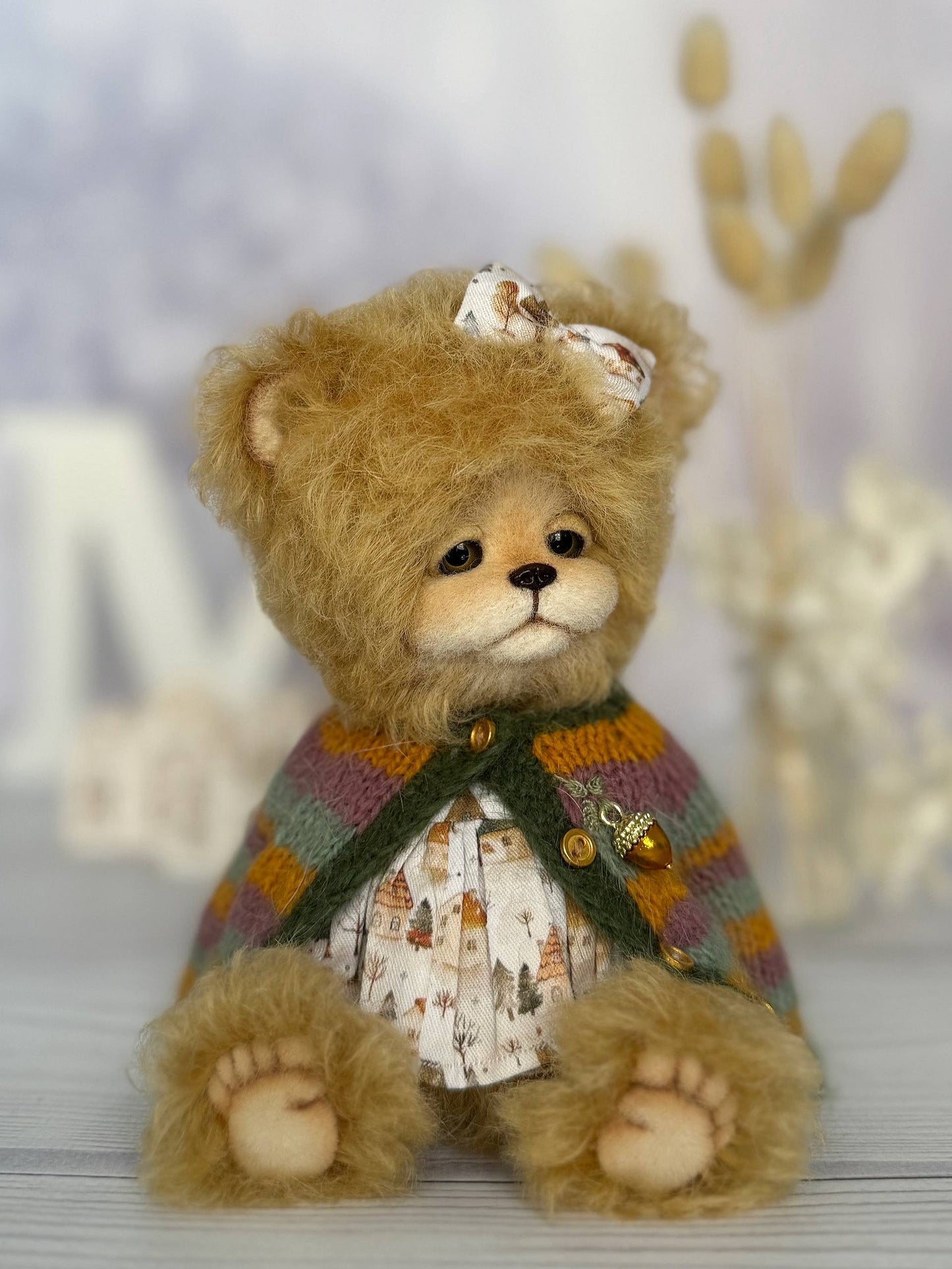 Elsa collectible bear - side view showing movable joints and fluffy fur