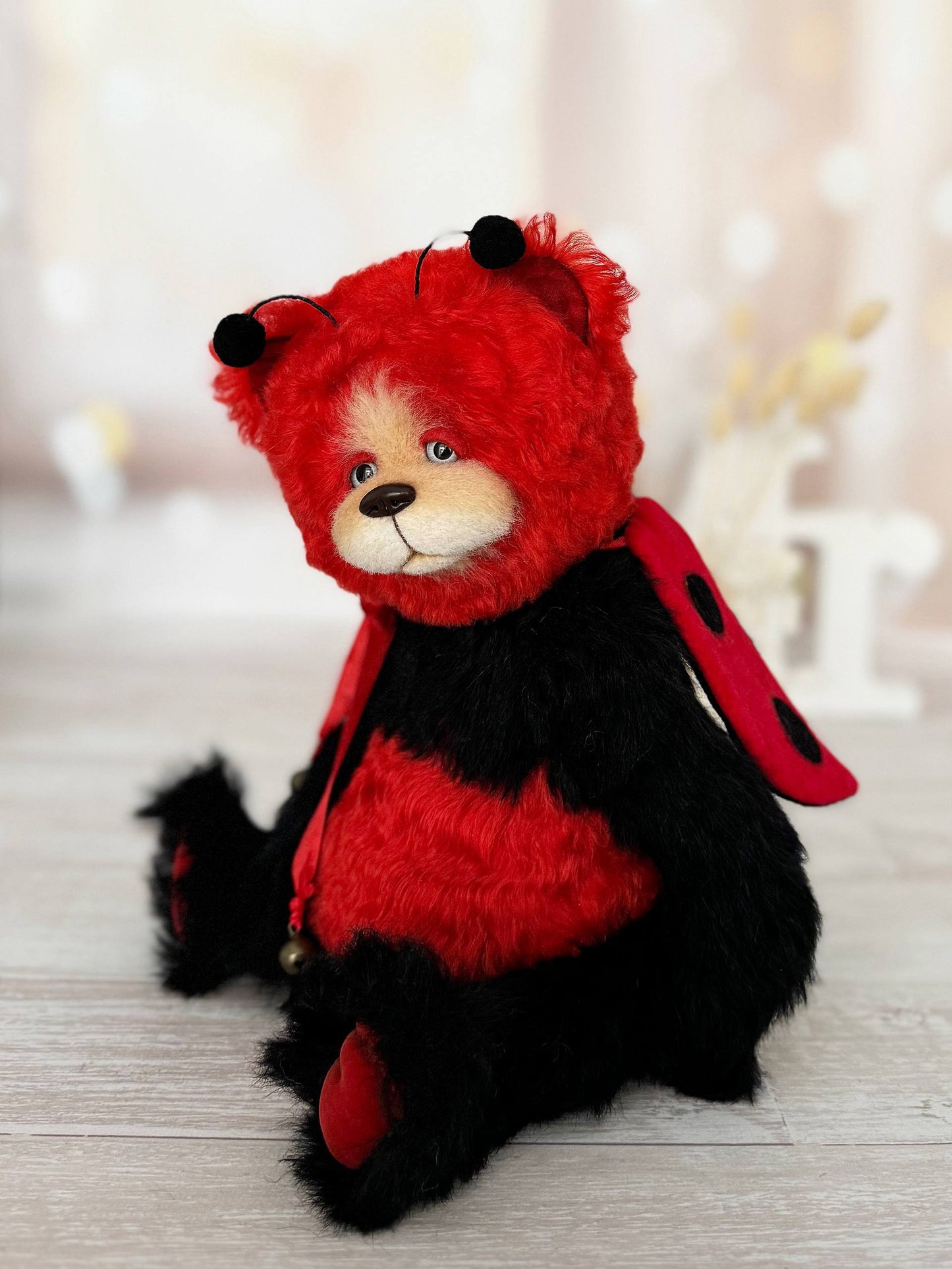 Handcrafted artist bear Scarlet Ladybug Deluxe with movable cotter pin joints, back view
