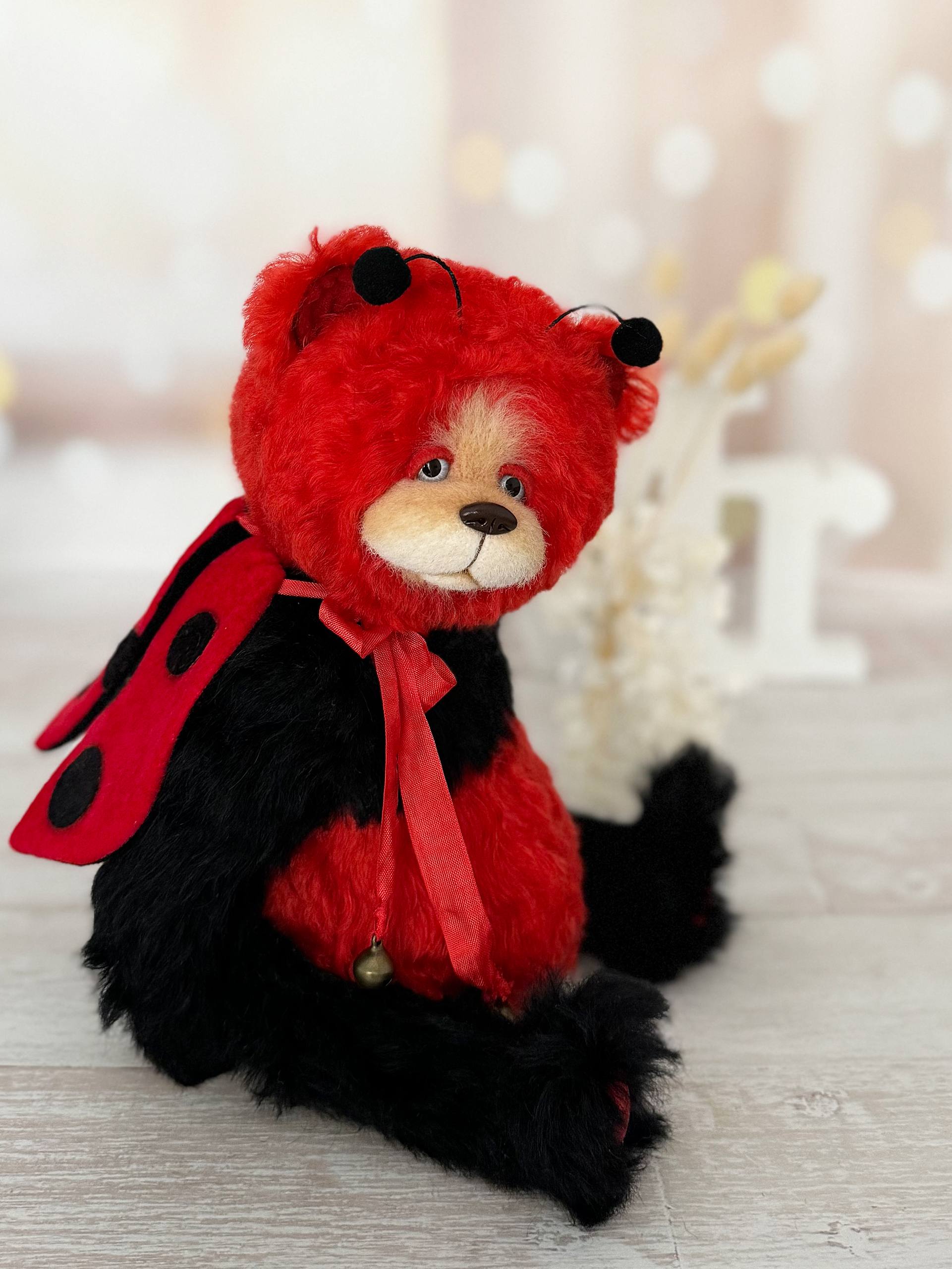 Scarlet Ladybug Deluxe mohair bear with soft dotted wings and sheer red overlay, detail view
